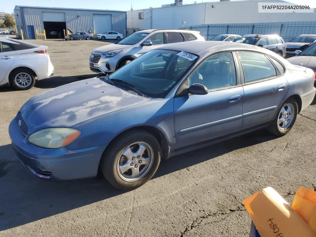 2004 Ford Taurus Lx VIN: 1FAFP52204A205096 Lot: 77357084