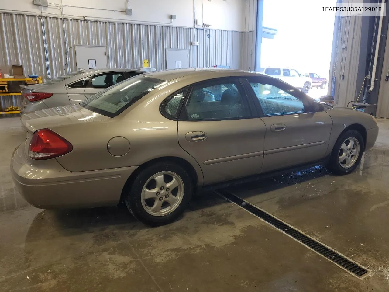 2005 Ford Taurus Se VIN: 1FAFP53U35A129018 Lot: 67100934