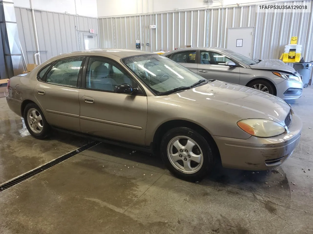 2005 Ford Taurus Se VIN: 1FAFP53U35A129018 Lot: 67100934