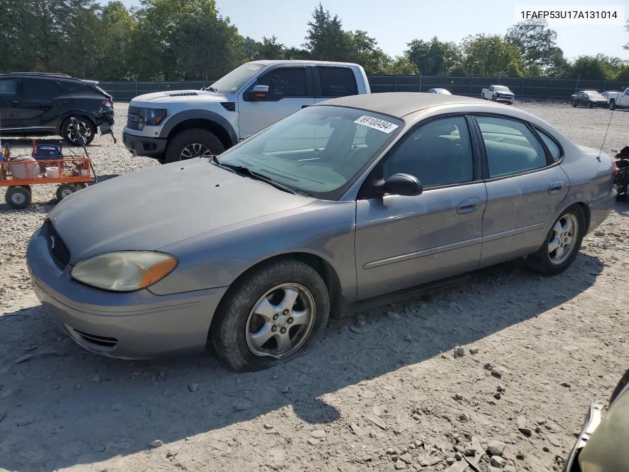 2007 Ford Taurus Se VIN: 1FAFP53U17A131014 Lot: 69100494