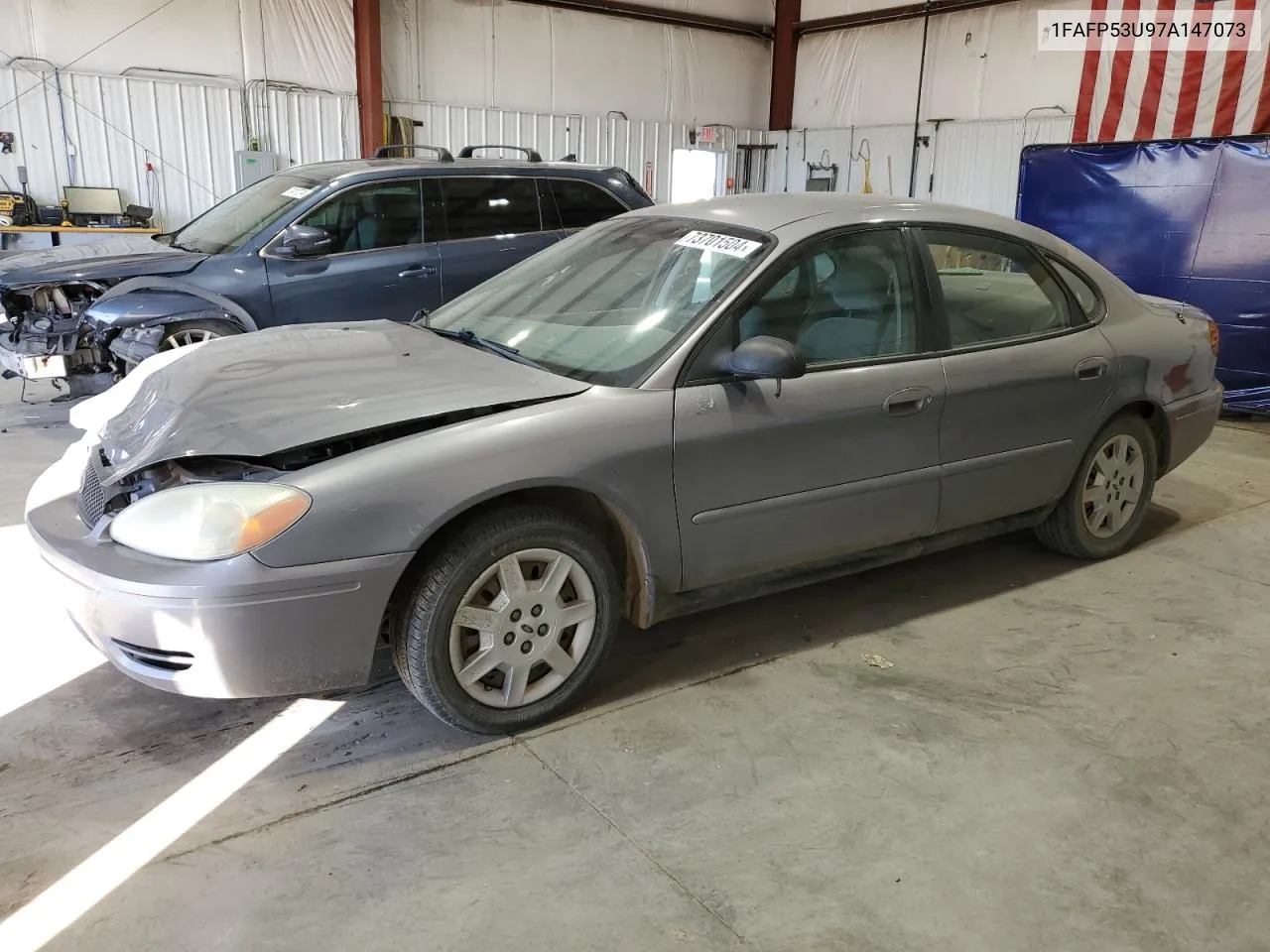 2007 Ford Taurus Se VIN: 1FAFP53U97A147073 Lot: 73701504