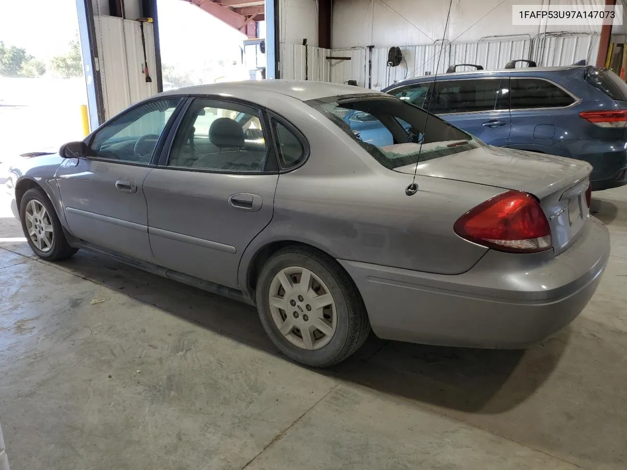 2007 Ford Taurus Se VIN: 1FAFP53U97A147073 Lot: 73701504