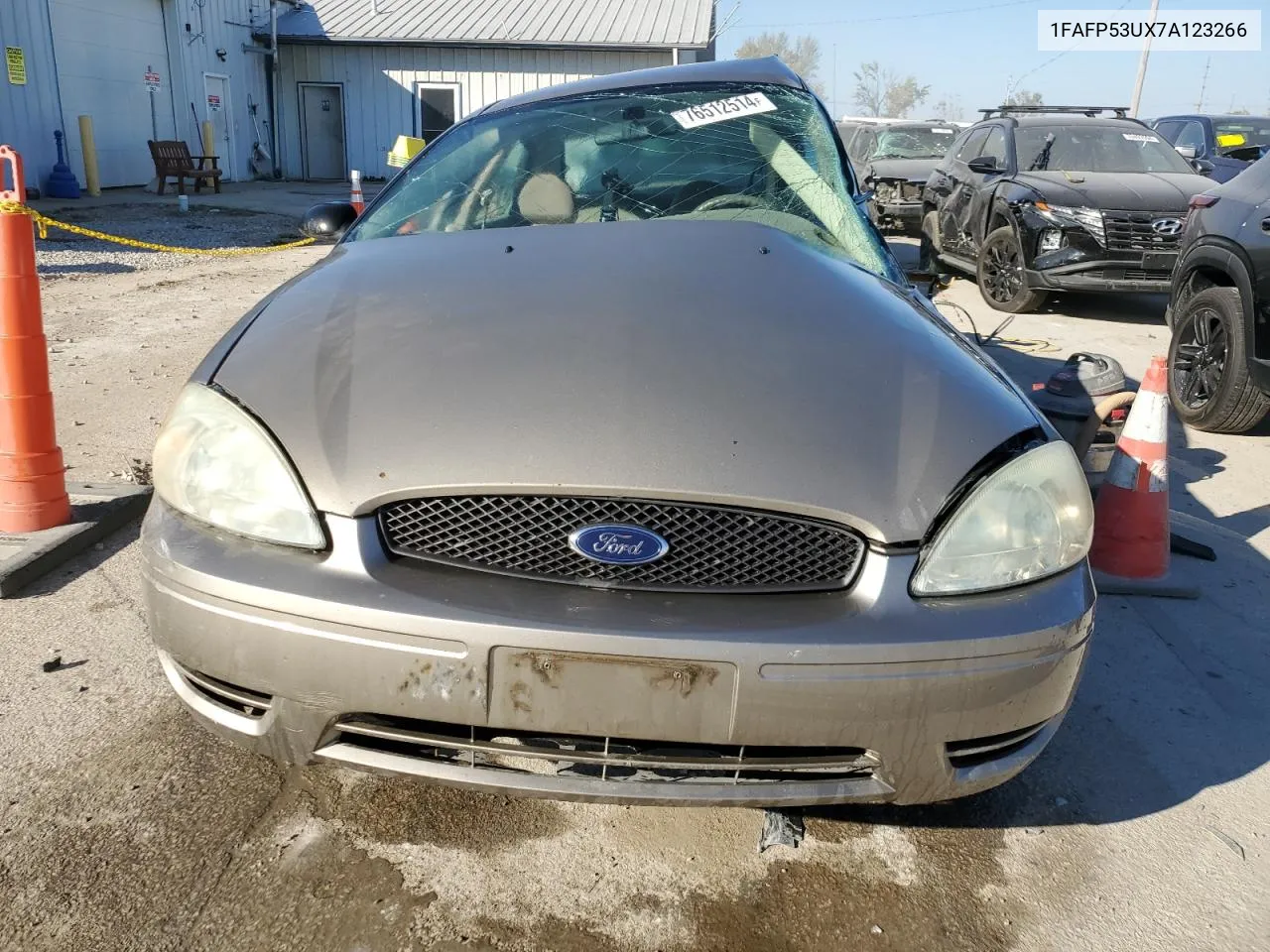 2007 Ford Taurus Se VIN: 1FAFP53UX7A123266 Lot: 76512514