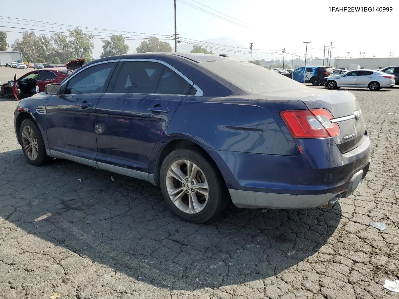 2011 Ford Taurus Sel VIN: 1FAHP2EW1BG140999 Lot: 76205464