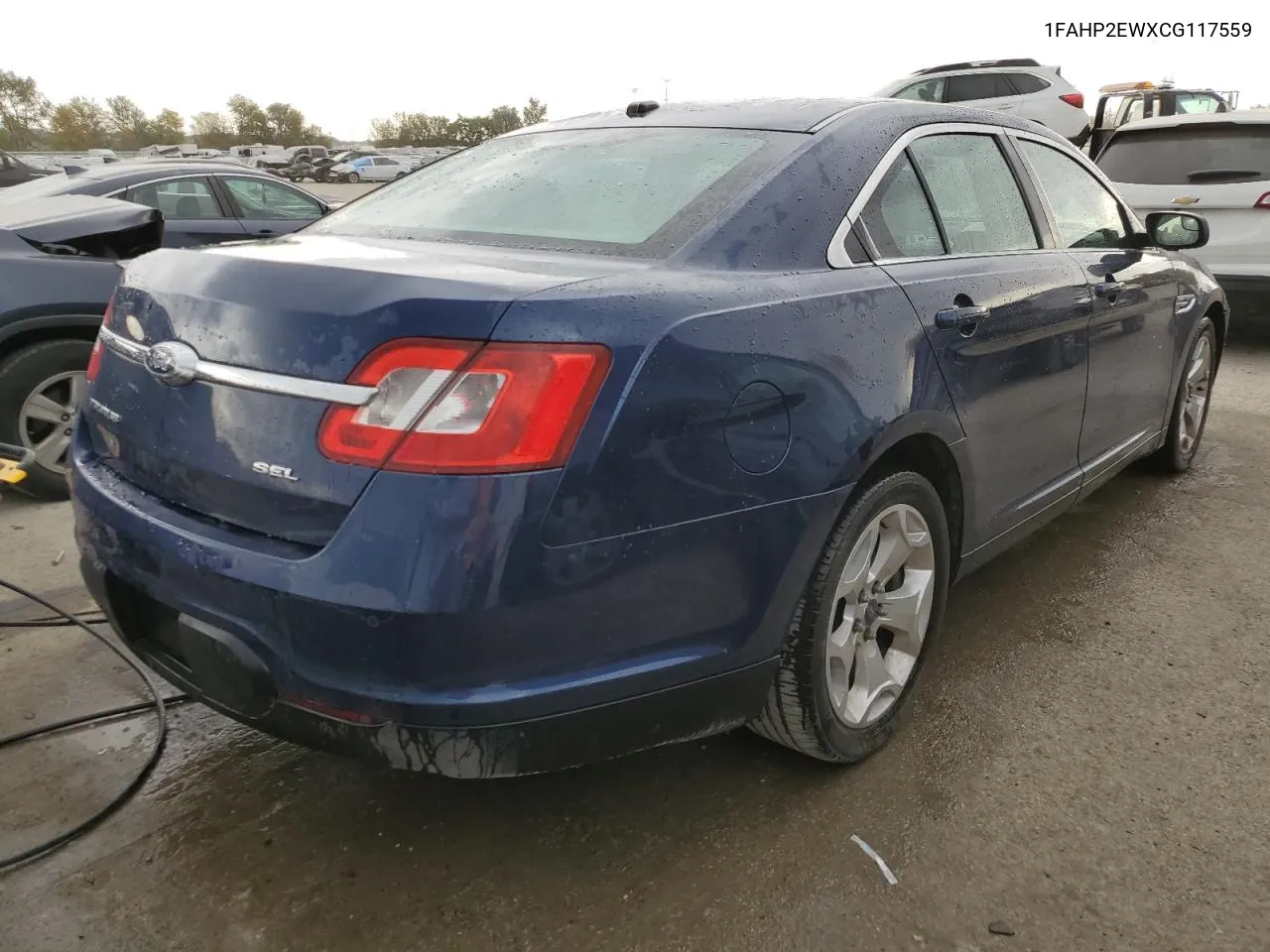 2012 Ford Taurus Sel VIN: 1FAHP2EWXCG117559 Lot: 76783004