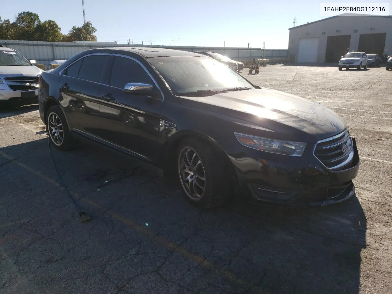 2013 Ford Taurus Limited VIN: 1FAHP2F84DG112116 Lot: 76602204