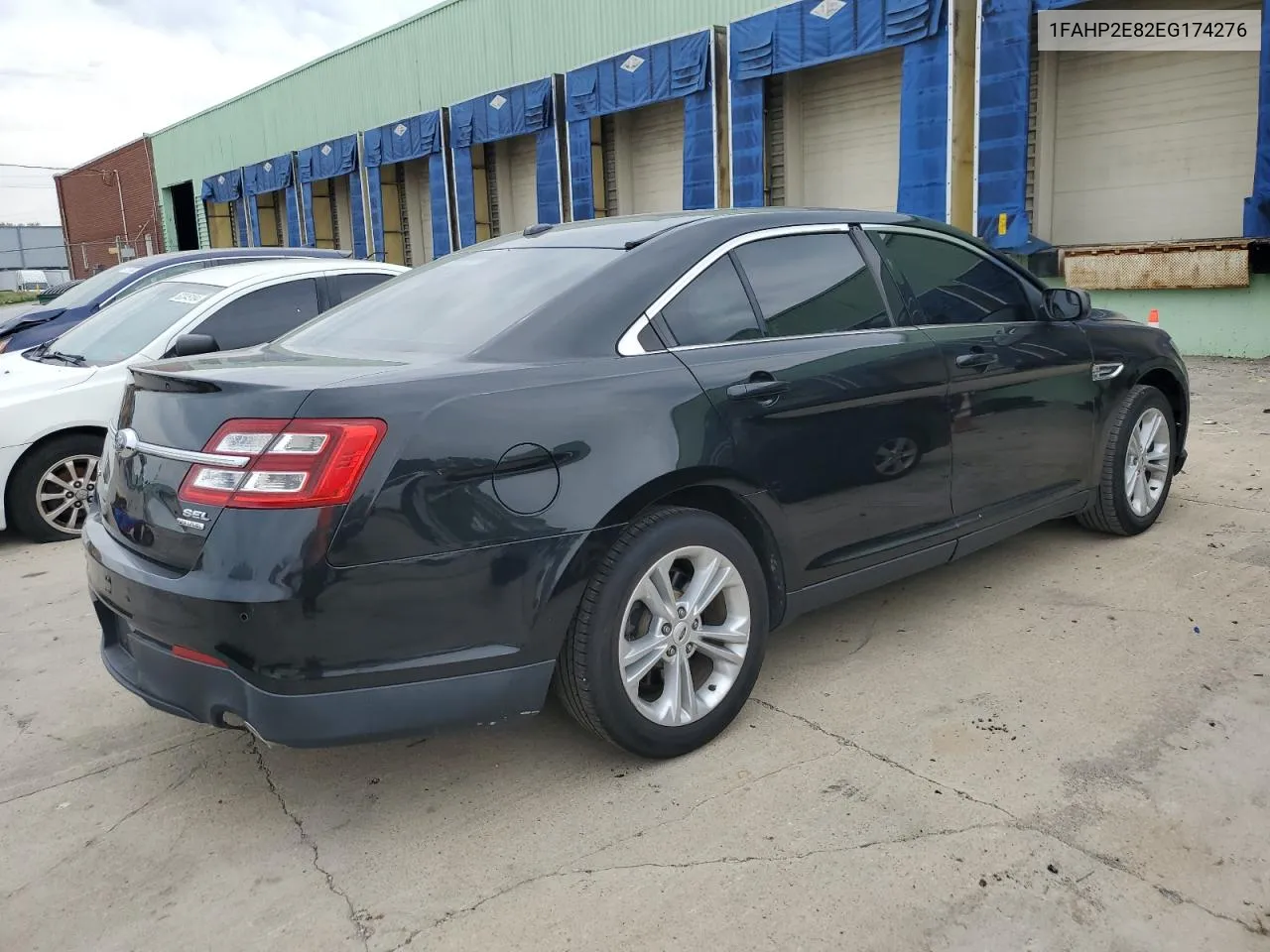 2014 Ford Taurus Sel VIN: 1FAHP2E82EG174276 Lot: 61590614