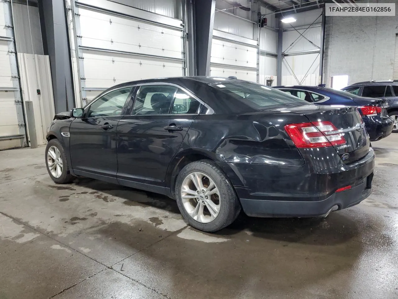 2014 Ford Taurus Sel VIN: 1FAHP2E84EG162856 Lot: 66204304