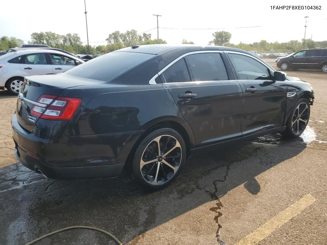 2014 Ford Taurus Limited VIN: 1FAHP2F8XEG104362 Lot: 69855464