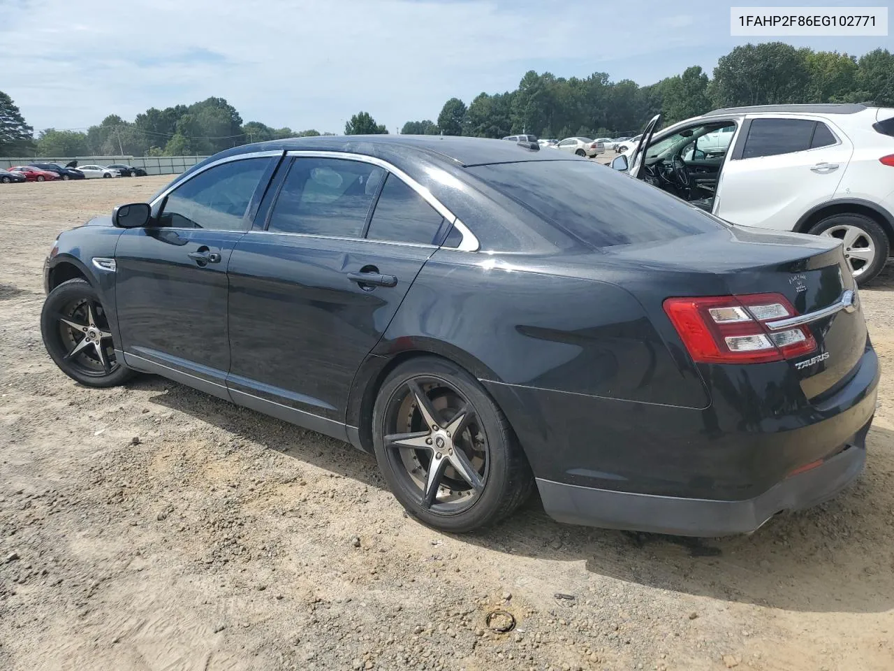 2014 Ford Taurus Limited VIN: 1FAHP2F86EG102771 Lot: 70234024