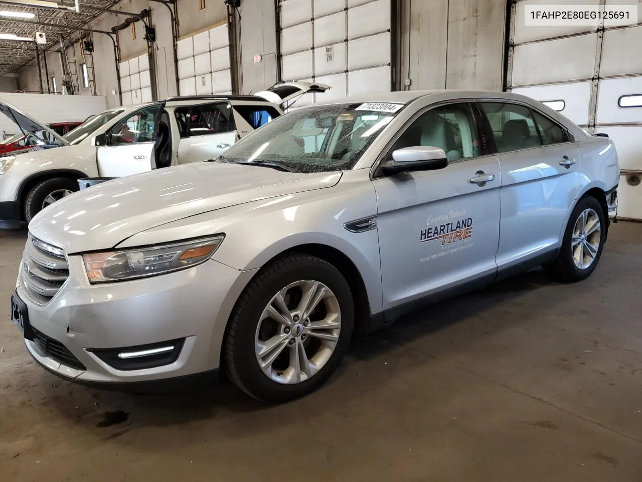 1FAHP2E80EG125691 2014 Ford Taurus Sel