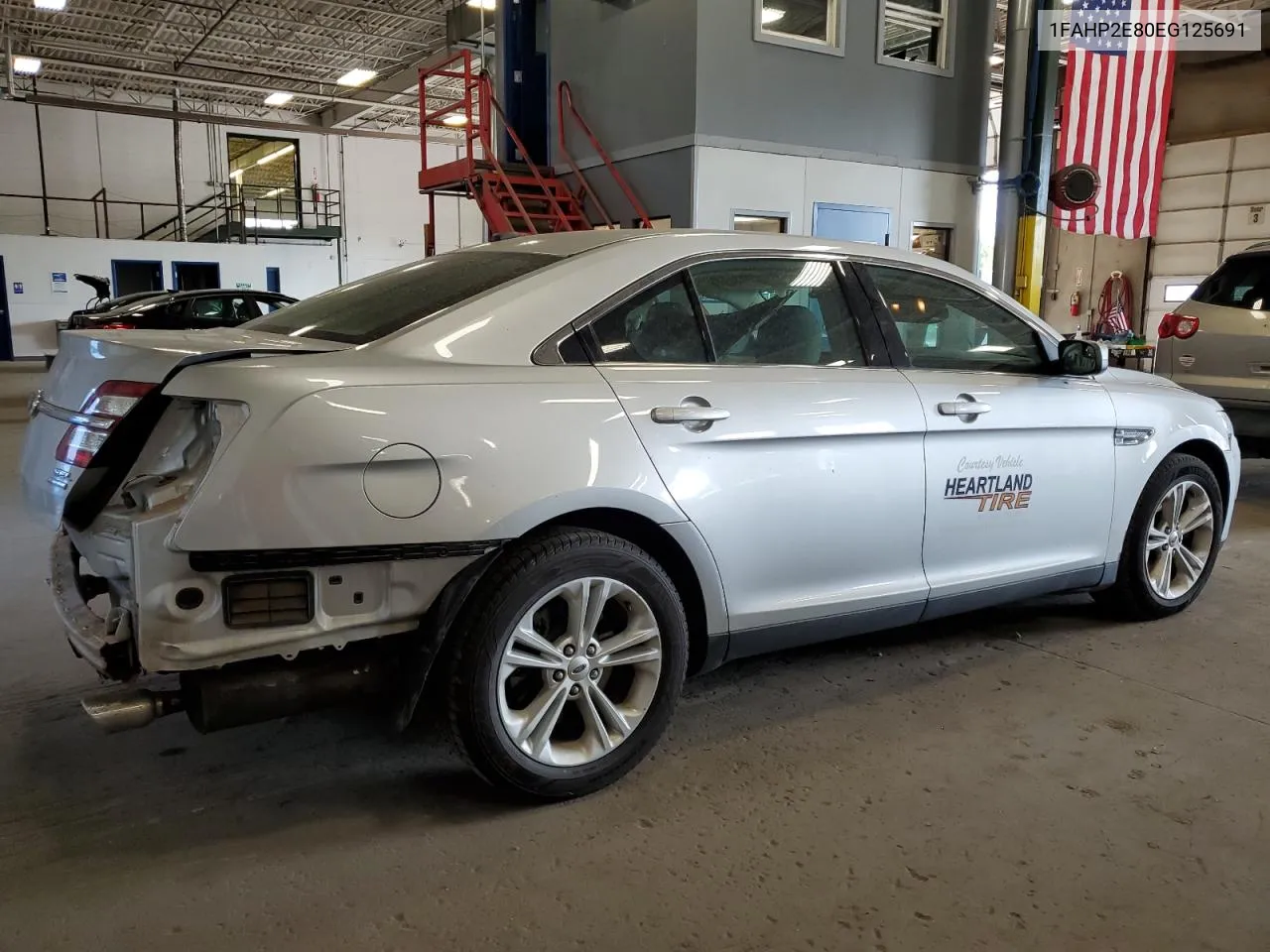 2014 Ford Taurus Sel VIN: 1FAHP2E80EG125691 Lot: 71323004