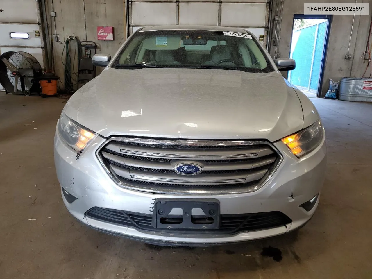 2014 Ford Taurus Sel VIN: 1FAHP2E80EG125691 Lot: 71323004