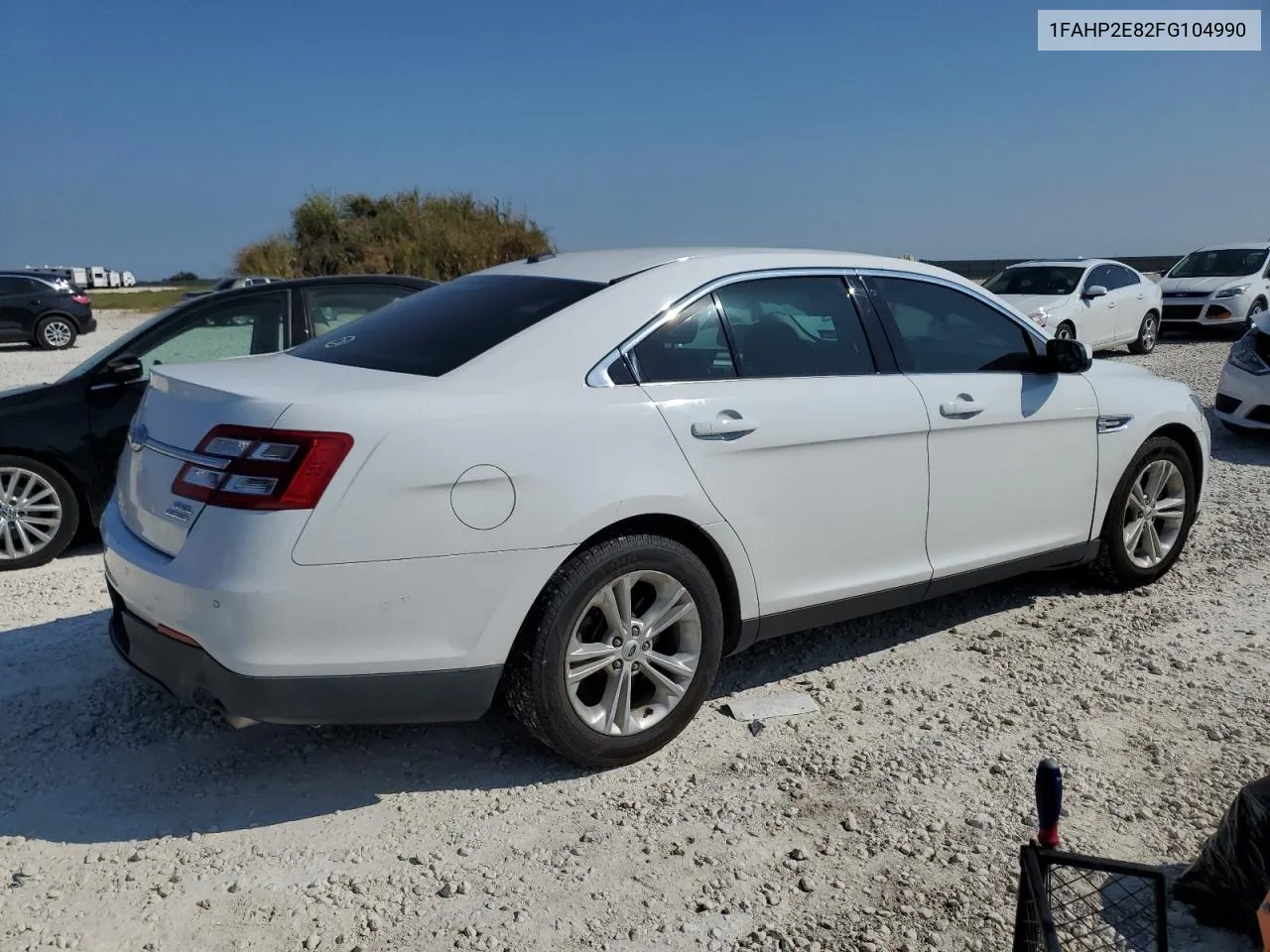 2015 Ford Taurus Sel VIN: 1FAHP2E82FG104990 Lot: 70254924