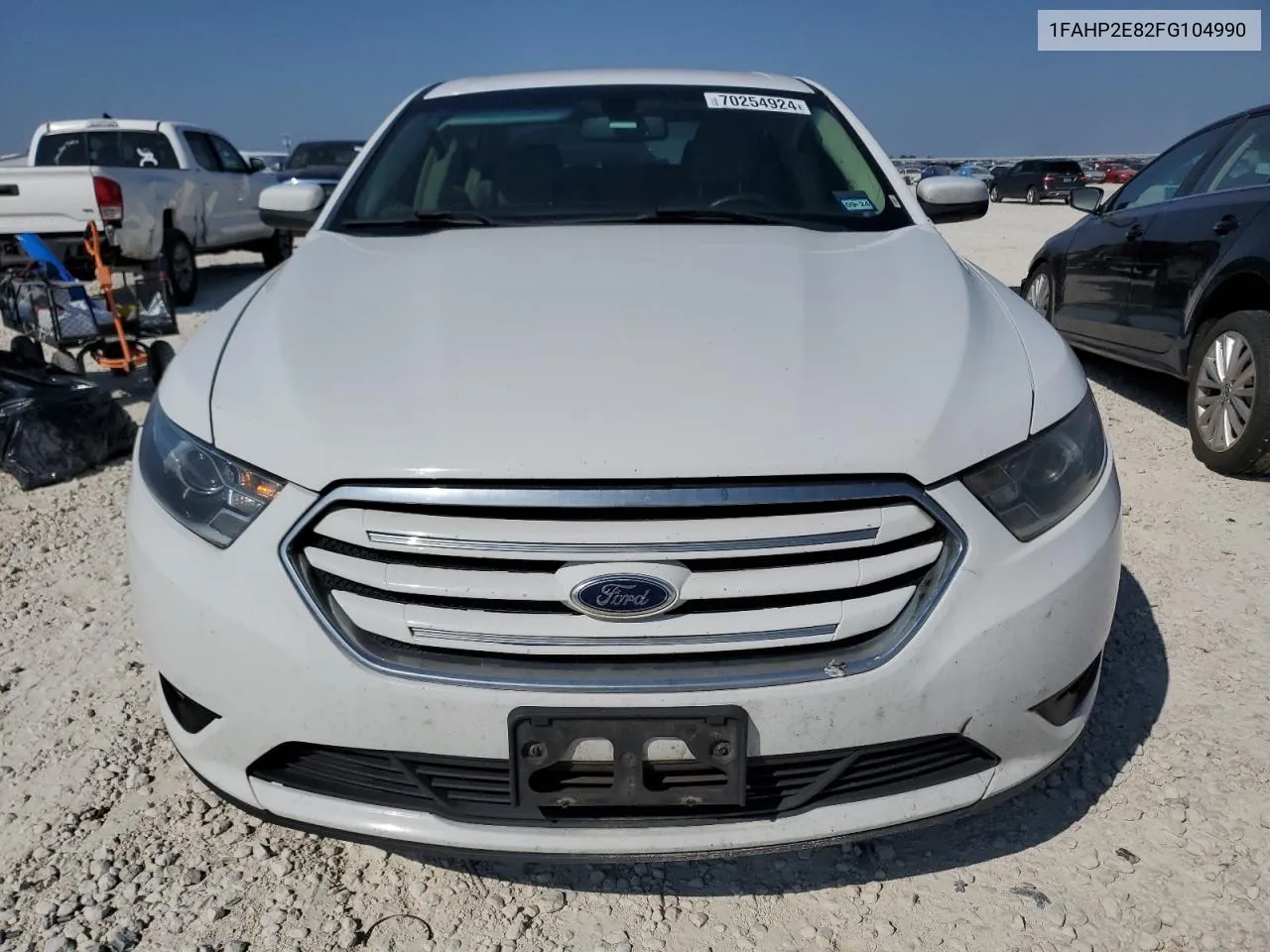 2015 Ford Taurus Sel VIN: 1FAHP2E82FG104990 Lot: 70254924