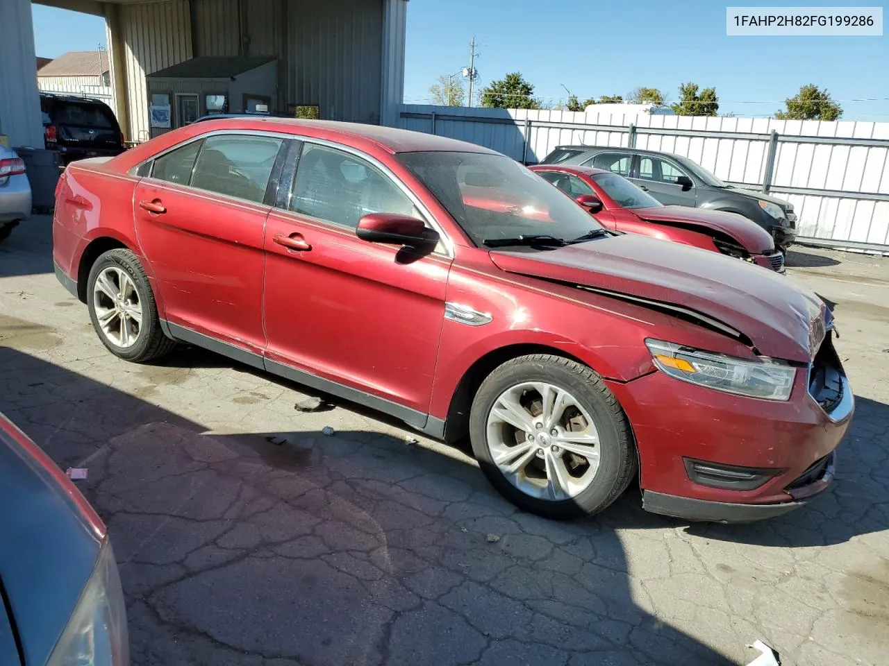 2015 Ford Taurus Sel VIN: 1FAHP2H82FG199286 Lot: 74960884