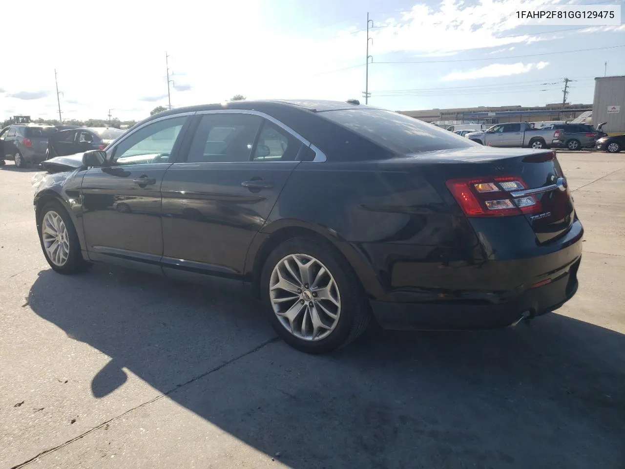 2016 Ford Taurus Limited VIN: 1FAHP2F81GG129475 Lot: 70840874