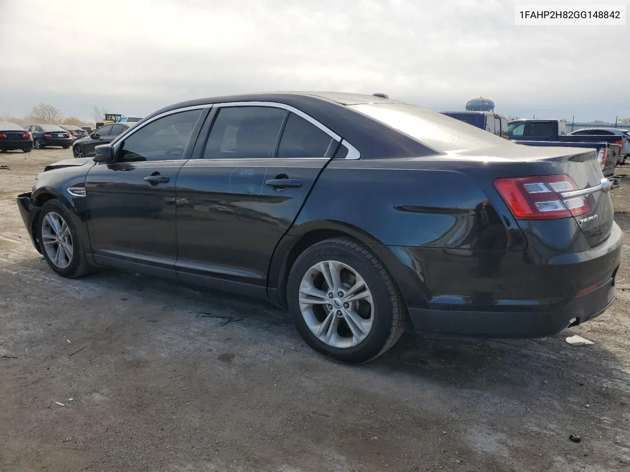 2016 Ford Taurus Sel VIN: 1FAHP2H82GG148842 Lot: 76952304