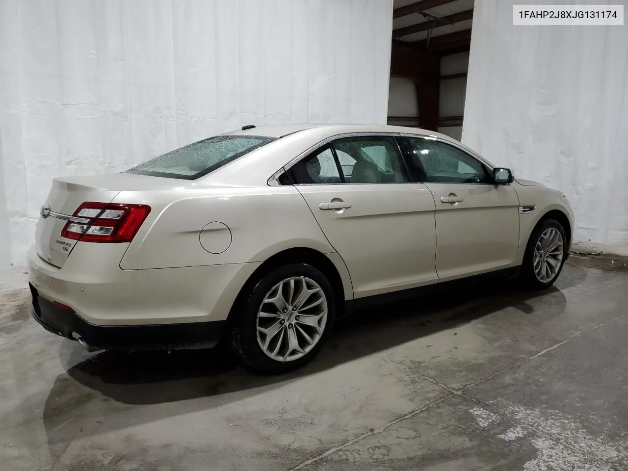 2018 Ford Taurus Limited VIN: 1FAHP2J8XJG131174 Lot: 76938944