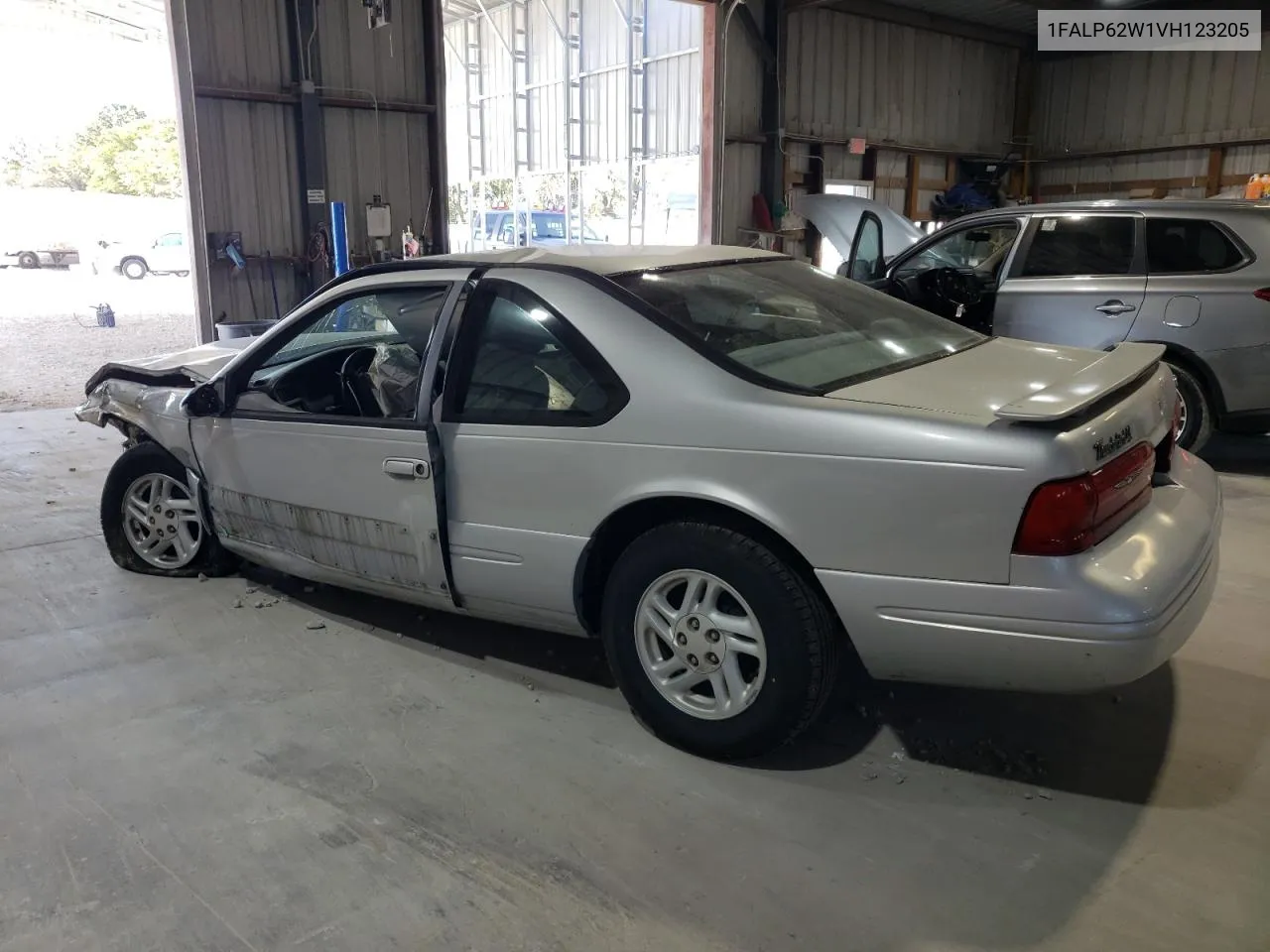 1997 Ford Thunderbird Lx VIN: 1FALP62W1VH123205 Lot: 76107654