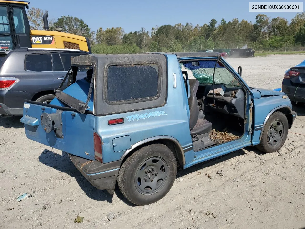 1995 Geo Tracker VIN: 2CNBE18UXS6930601 Lot: 76079094