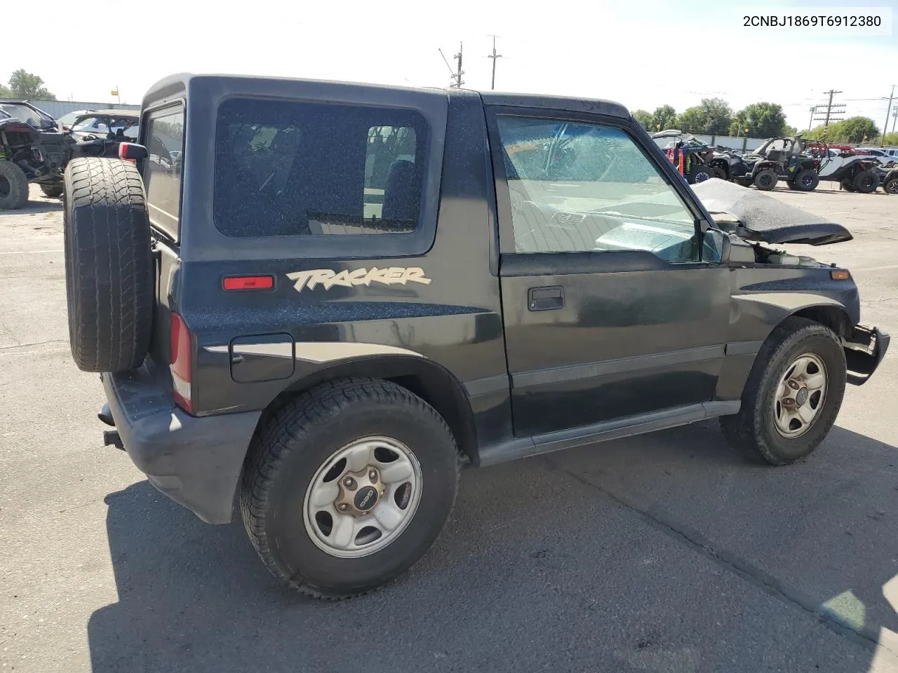 1996 Geo Tracker VIN: 2CNBJ1869T6912380 Lot: 68080054