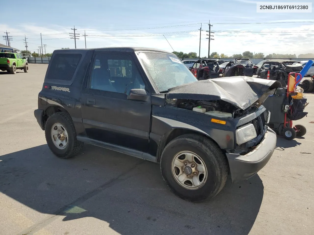 1996 Geo Tracker VIN: 2CNBJ1869T6912380 Lot: 68080054