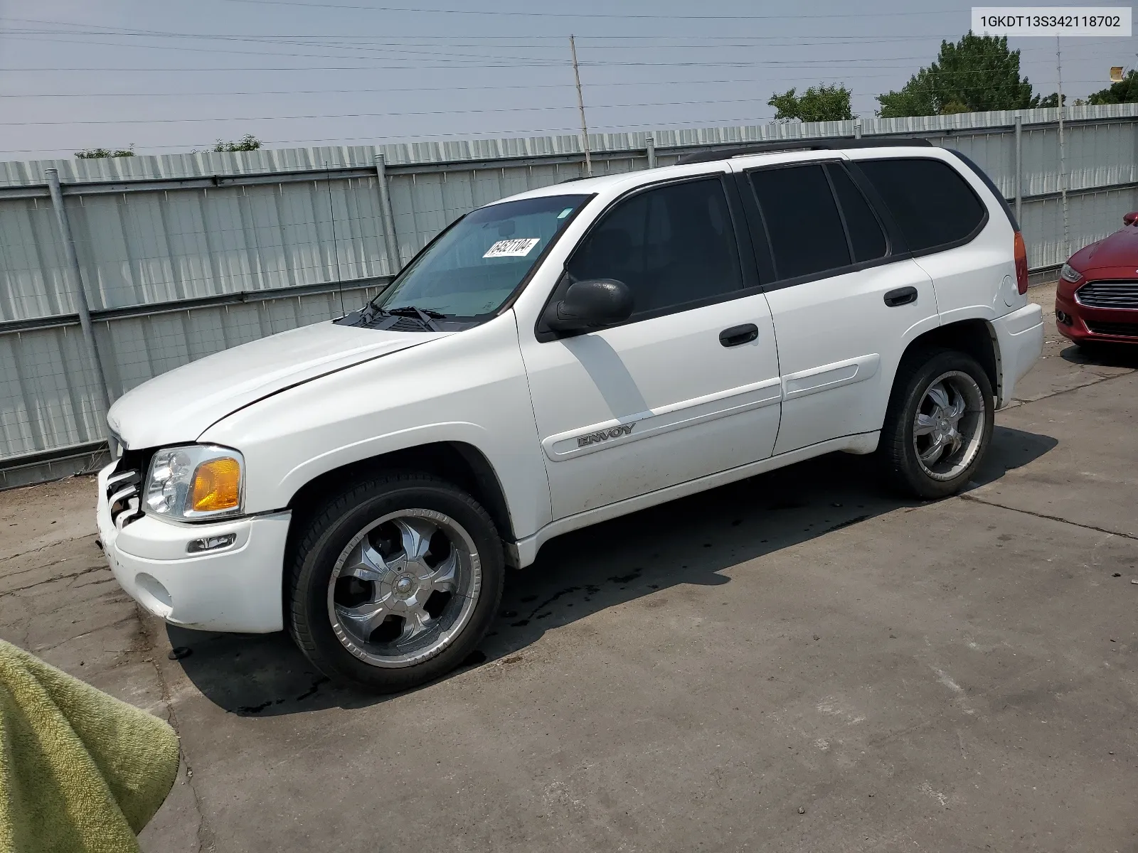 2004 GMC Envoy VIN: 1GKDT13S342118702 Lot: 64521104