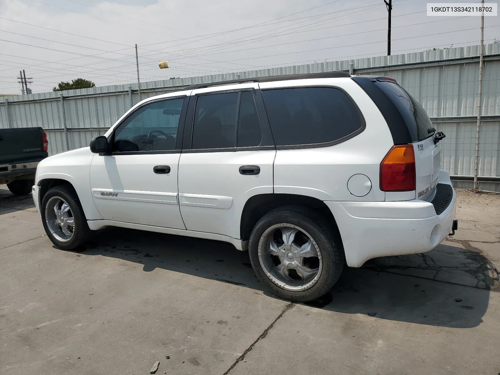 2004 GMC Envoy VIN: 1GKDT13S342118702 Lot: 64521104