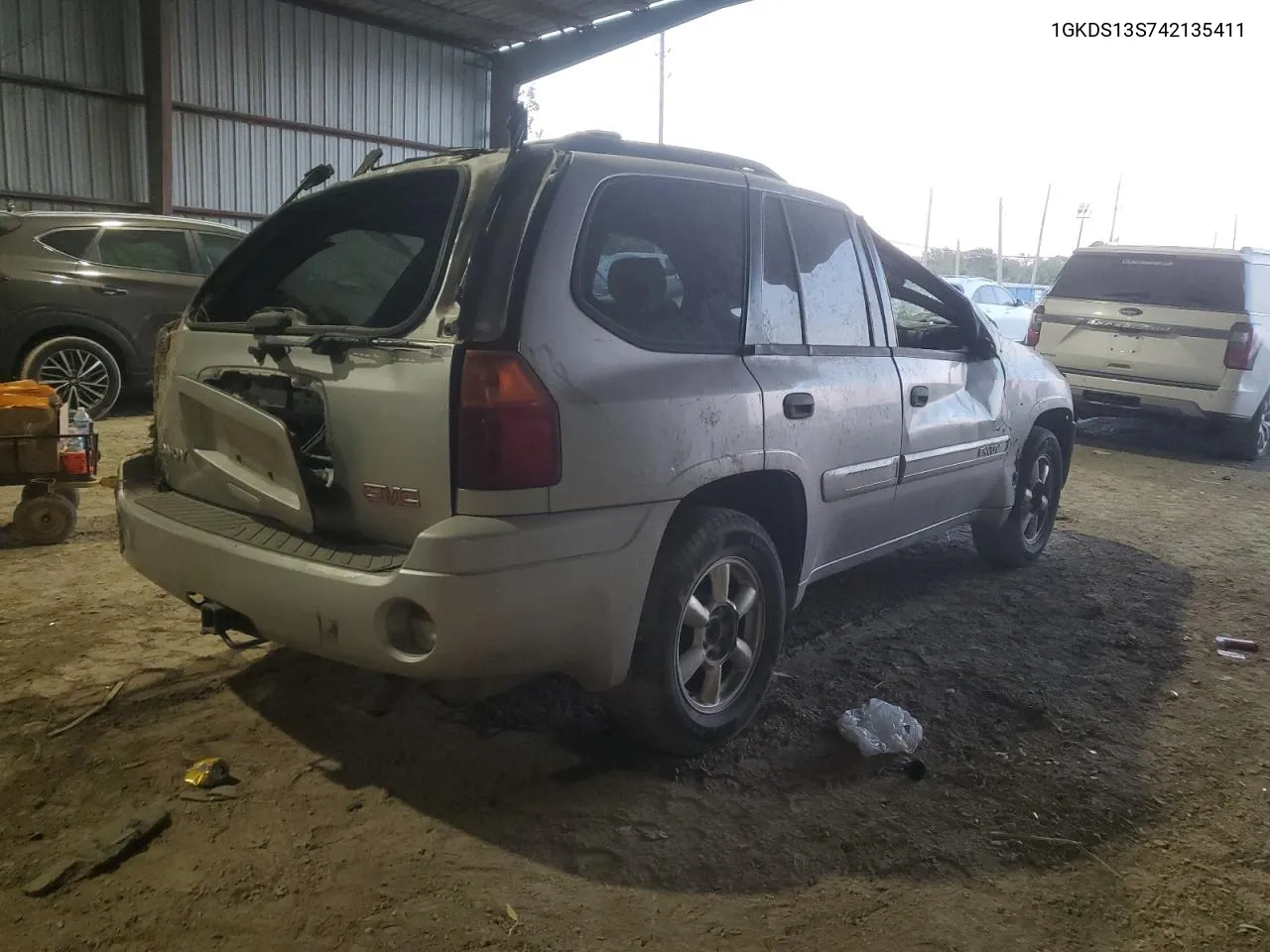 2004 GMC Envoy VIN: 1GKDS13S742135411 Lot: 74407374