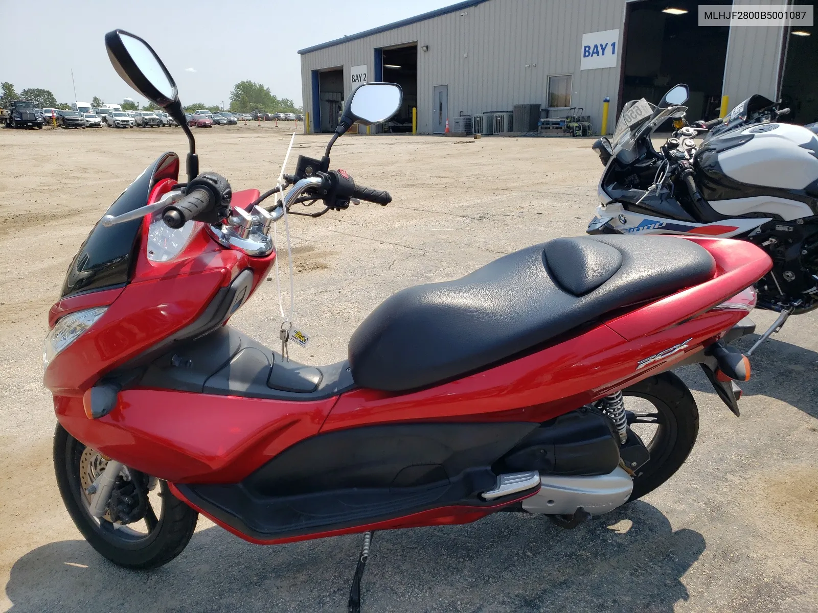 2011 Honda Pcx VIN: MLHJF2800B5001087 Lot: 65086784