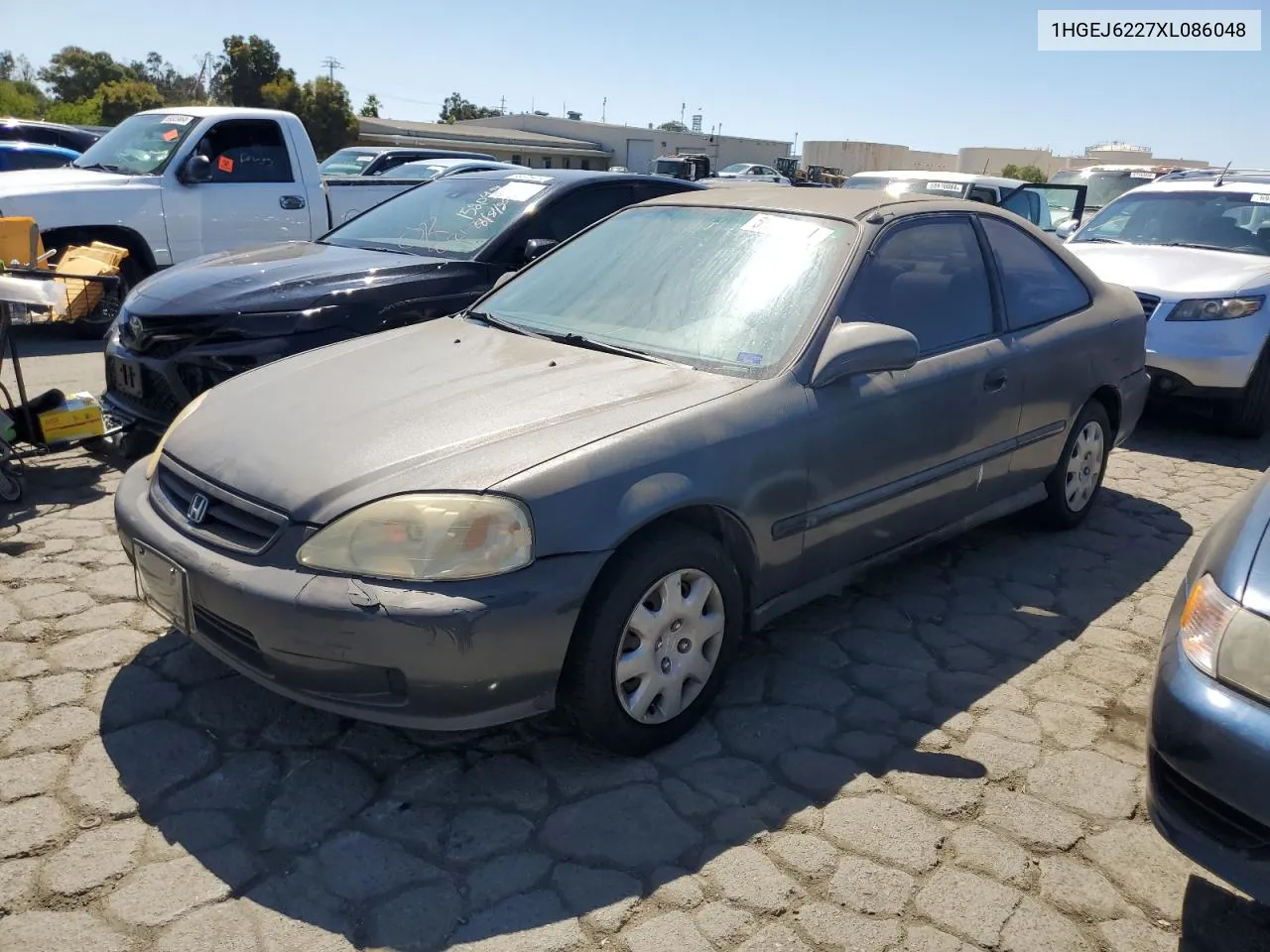 1999 Honda Civic Dx VIN: 1HGEJ6227XL086048 Lot: 69161104