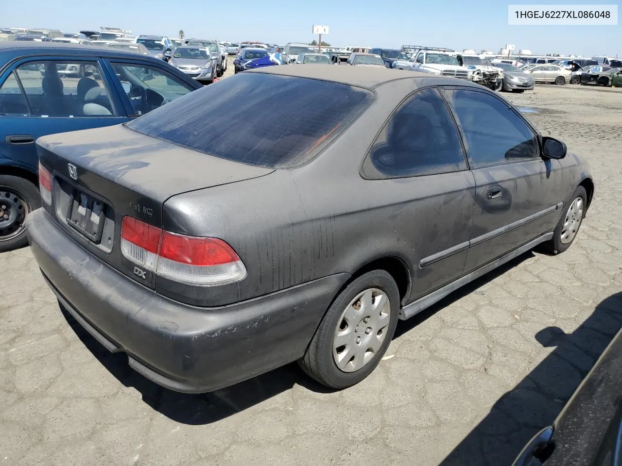 1999 Honda Civic Dx VIN: 1HGEJ6227XL086048 Lot: 69161104