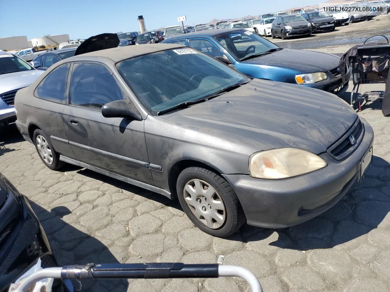 1999 Honda Civic Dx VIN: 1HGEJ6227XL086048 Lot: 69161104