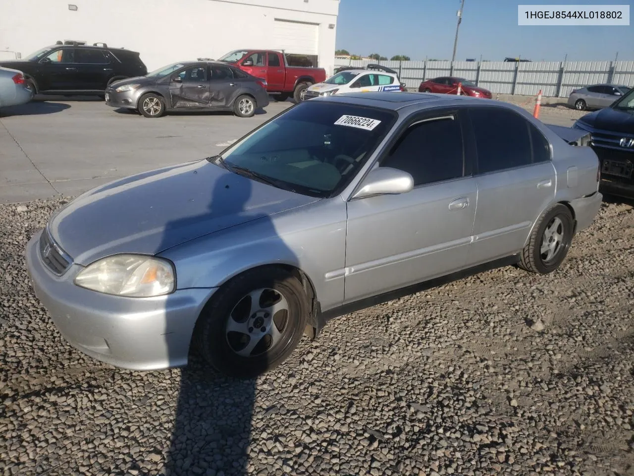 1999 Honda Civic Ex VIN: 1HGEJ8544XL018802 Lot: 70666224