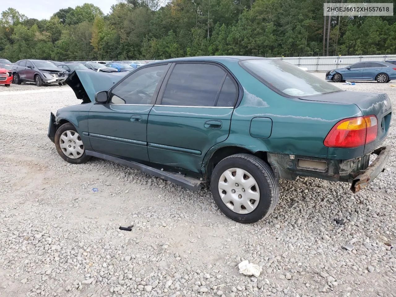 1999 Honda Civic Base VIN: 2HGEJ6612XH557618 Lot: 74052354