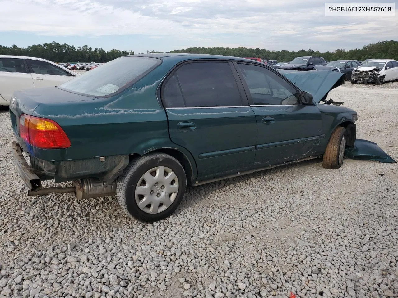 1999 Honda Civic Base VIN: 2HGEJ6612XH557618 Lot: 74052354