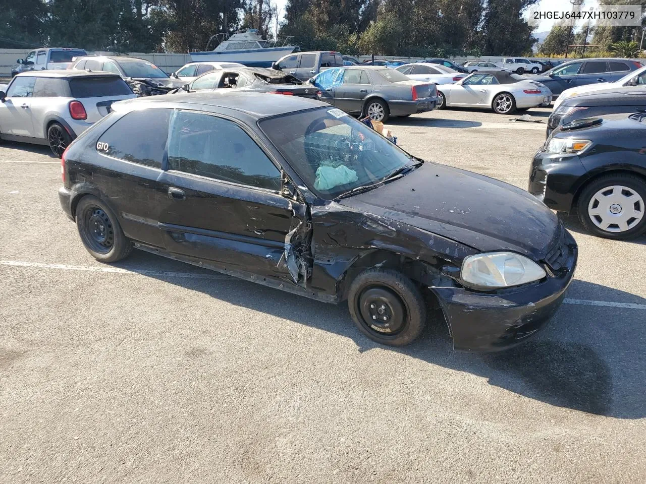 1999 Honda Civic Dx VIN: 2HGEJ6447XH103779 Lot: 78211544