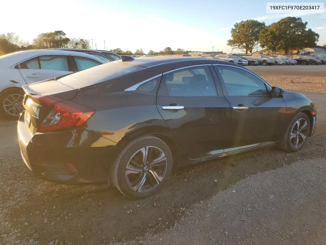 2016 Honda Civic Touring VIN: 19XFC1F97GE203417 Lot: 77034614