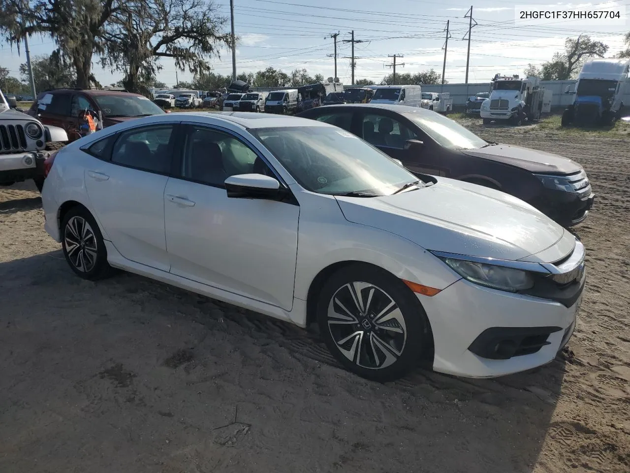 2017 Honda Civic Ex VIN: 2HGFC1F37HH657704 Lot: 79951174