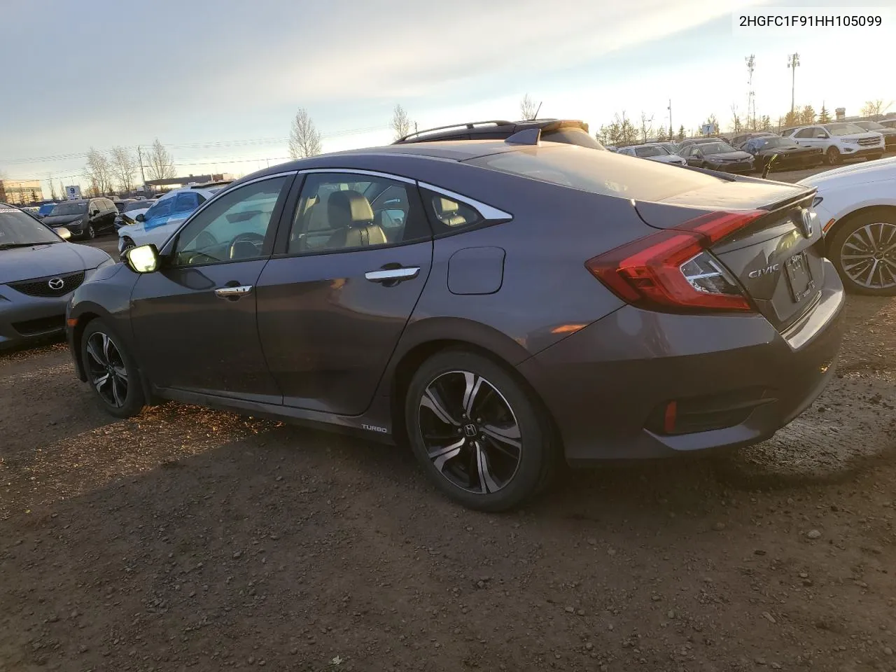 2017 Honda Civic Touring VIN: 2HGFC1F91HH105099 Lot: 80768544