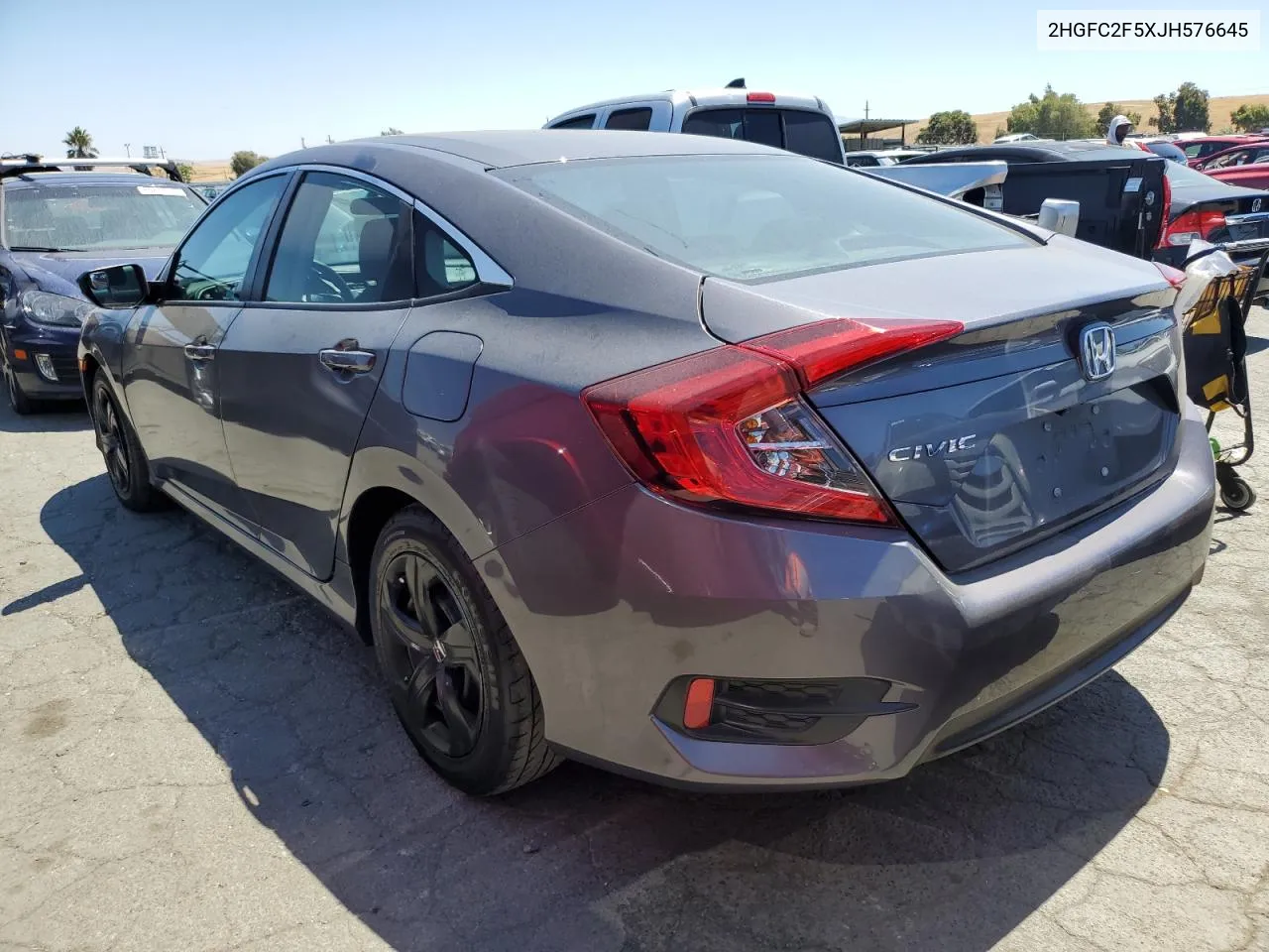 2018 Honda Civic Lx VIN: 2HGFC2F5XJH576645 Lot: 66029474