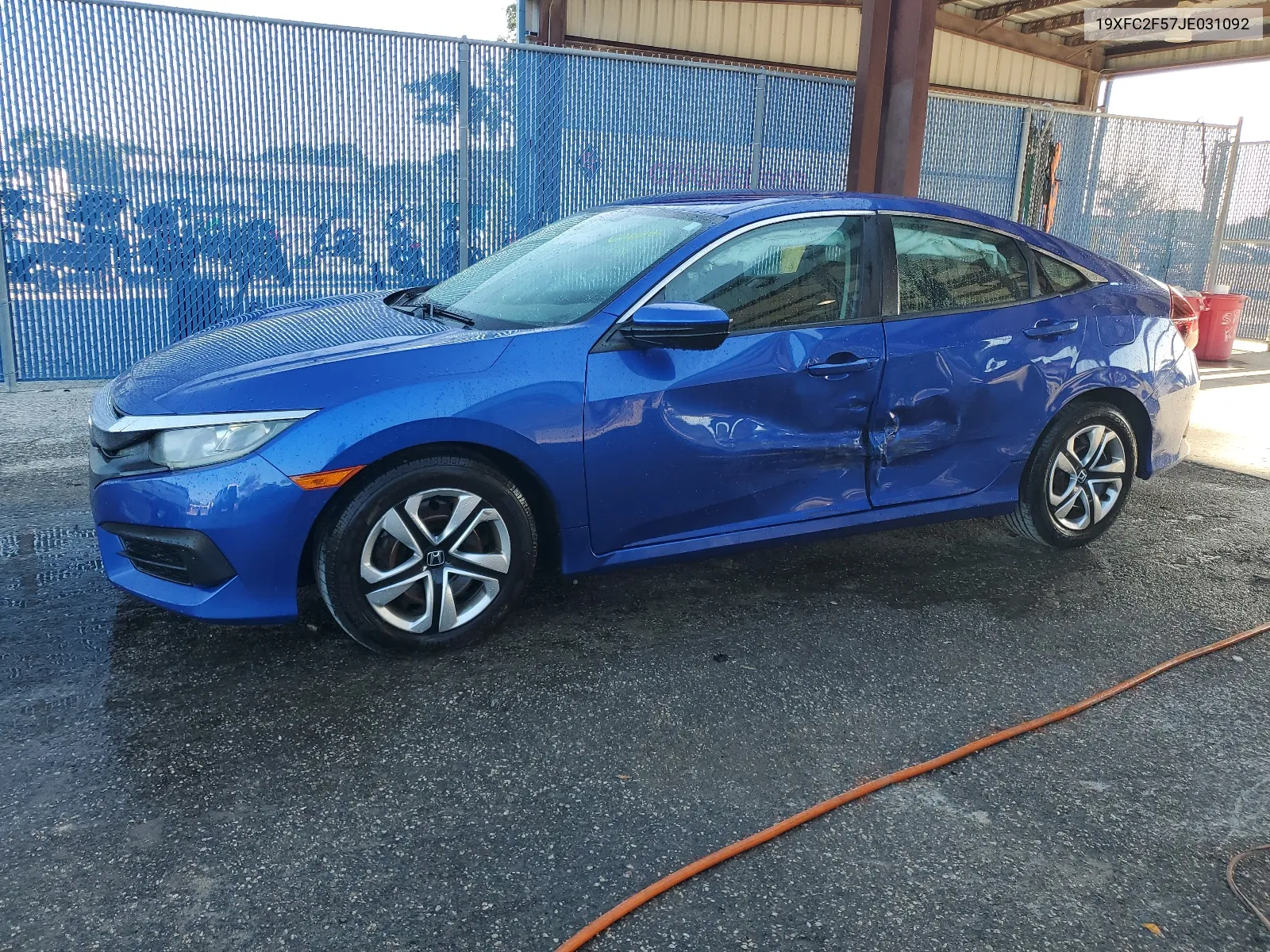 2018 Honda Civic Lx VIN: 19XFC2F57JE031092 Lot: 67186954