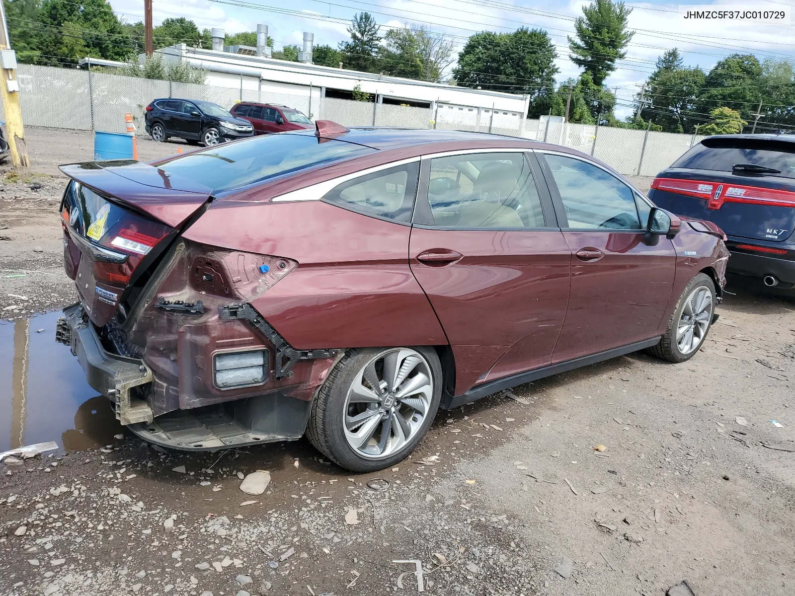 2018 Honda Clarity Touring VIN: JHMZC5F37JC010729 Lot: 68067054