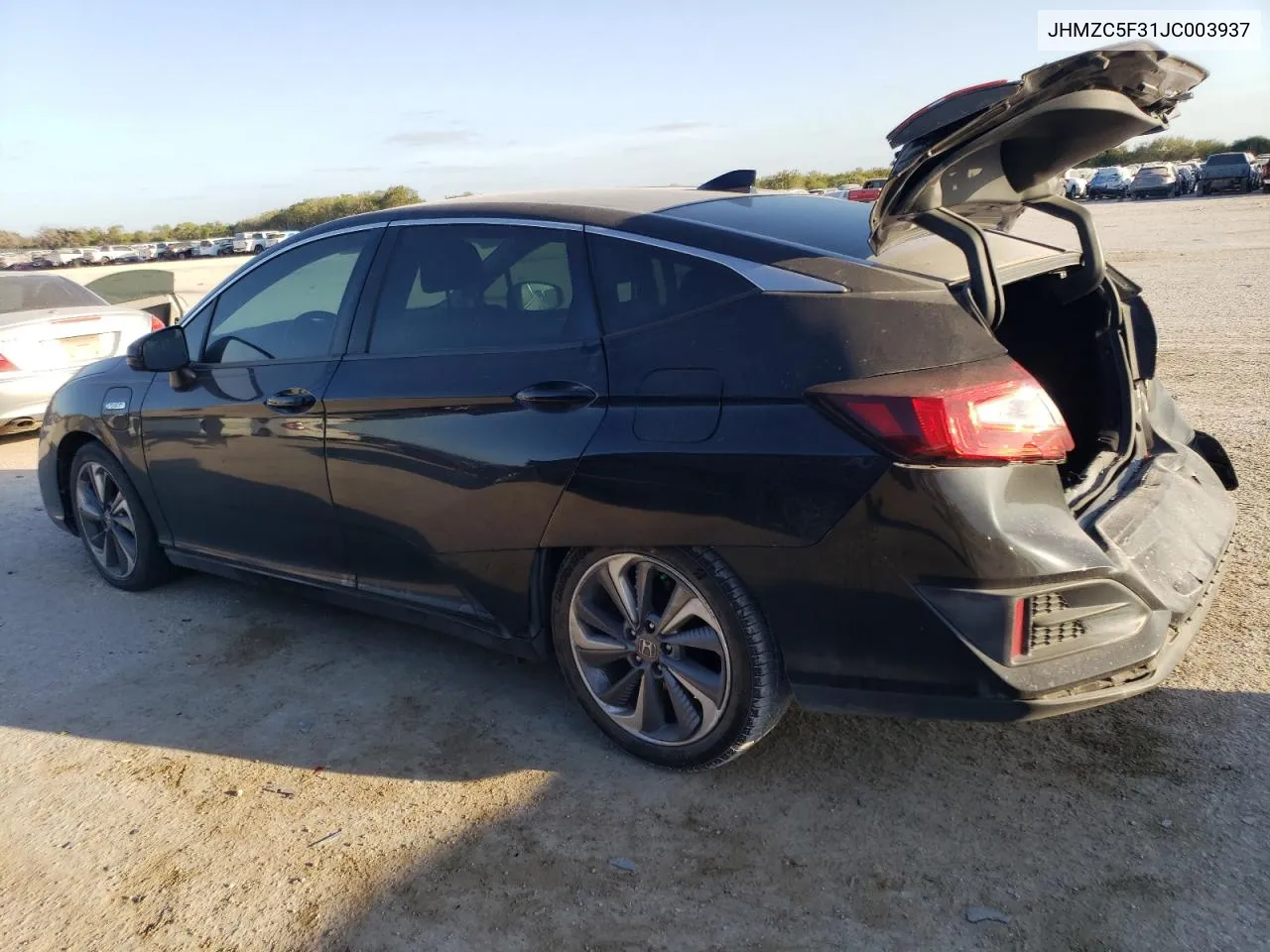 2018 Honda Clarity Touring VIN: JHMZC5F31JC003937 Lot: 76705184