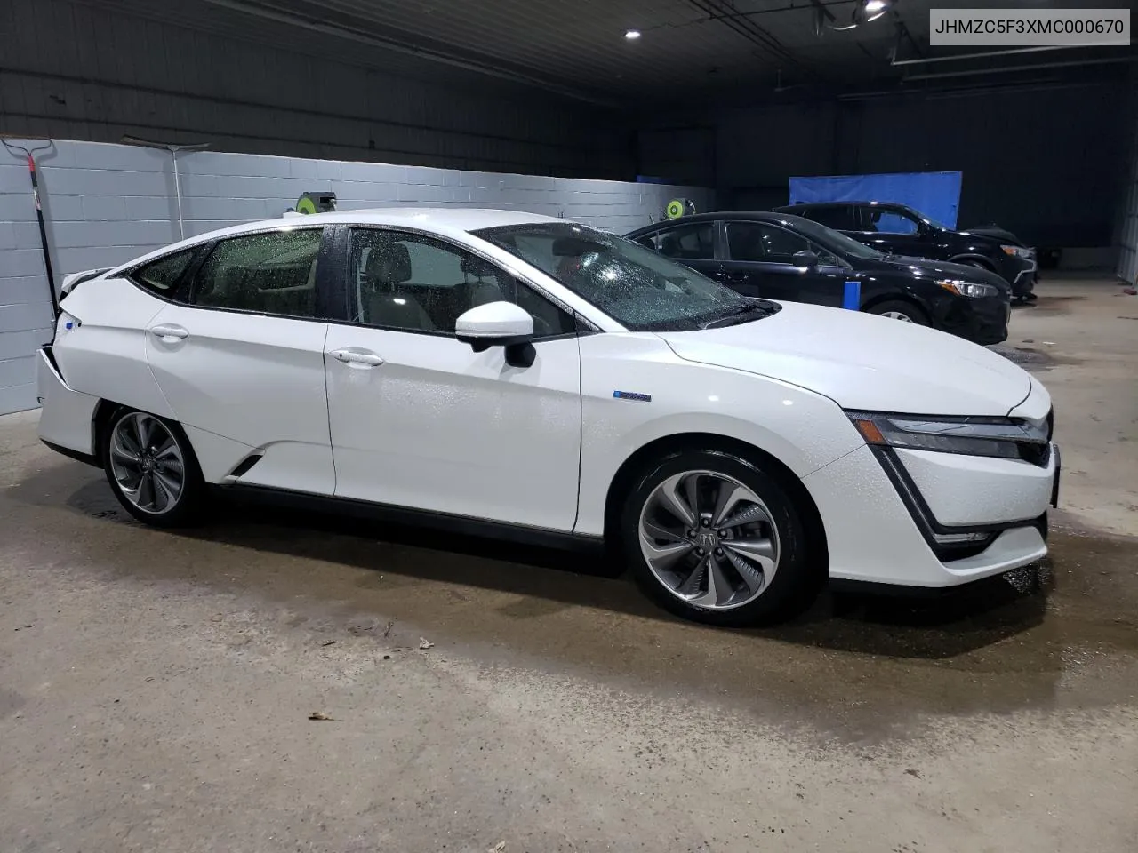 2021 Honda Clarity Touring VIN: JHMZC5F3XMC000670 Lot: 61128474