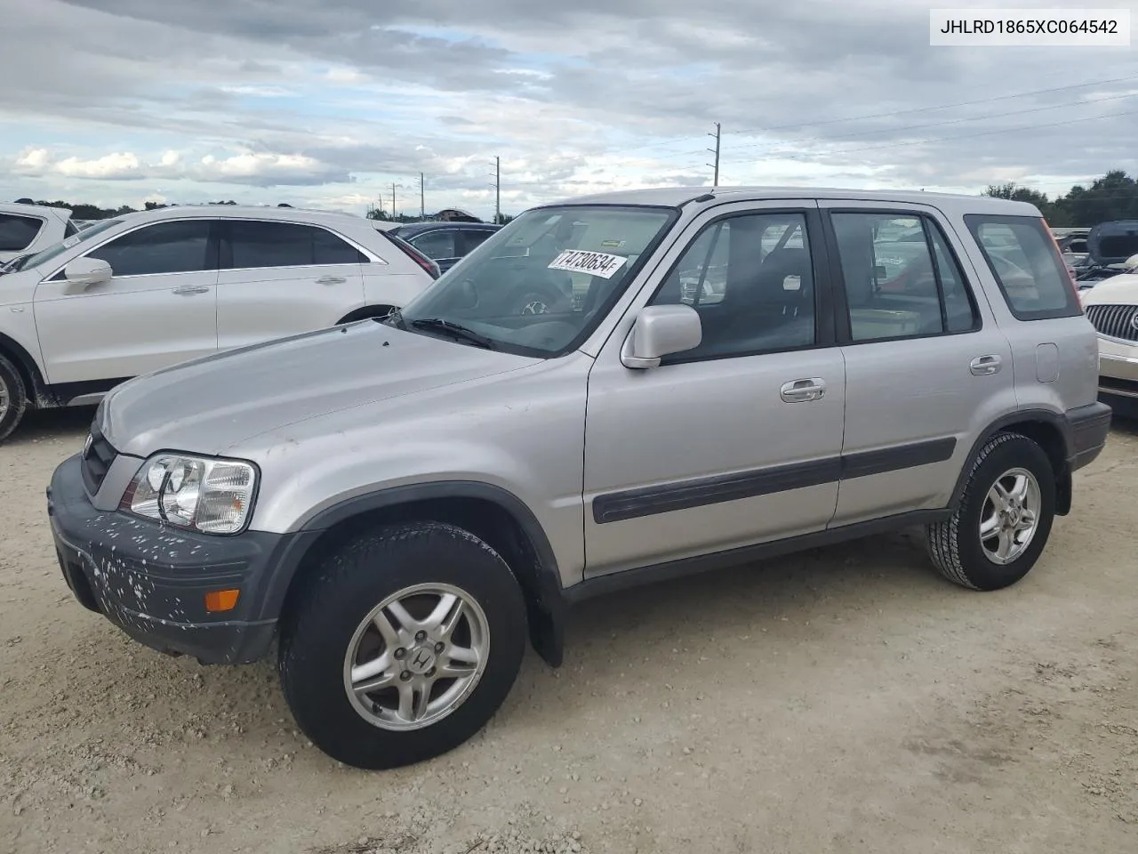 1999 Honda Cr-V Ex VIN: JHLRD1865XC064542 Lot: 74730634