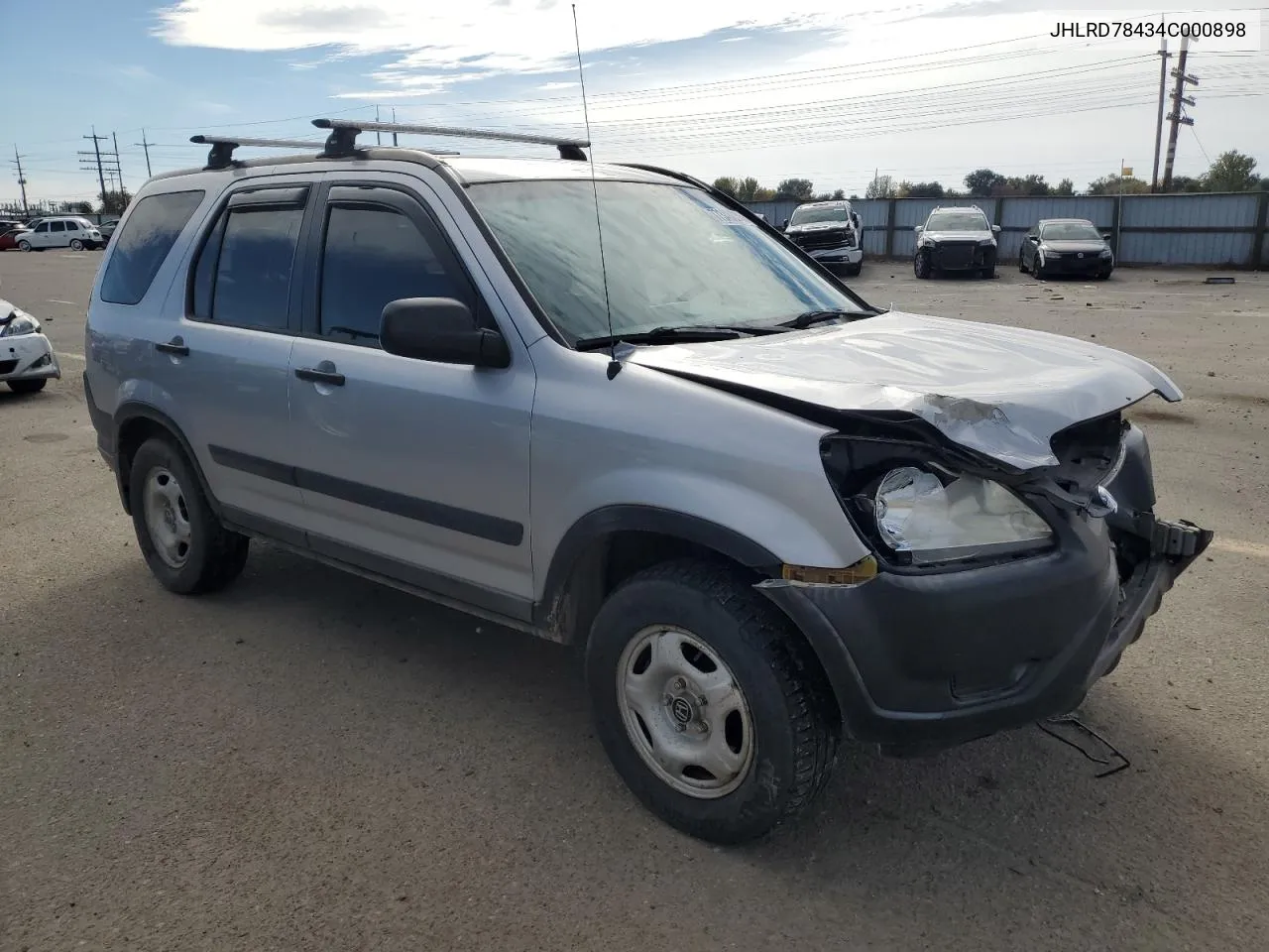 2004 Honda Cr-V Lx VIN: JHLRD78434C000898 Lot: 77348224