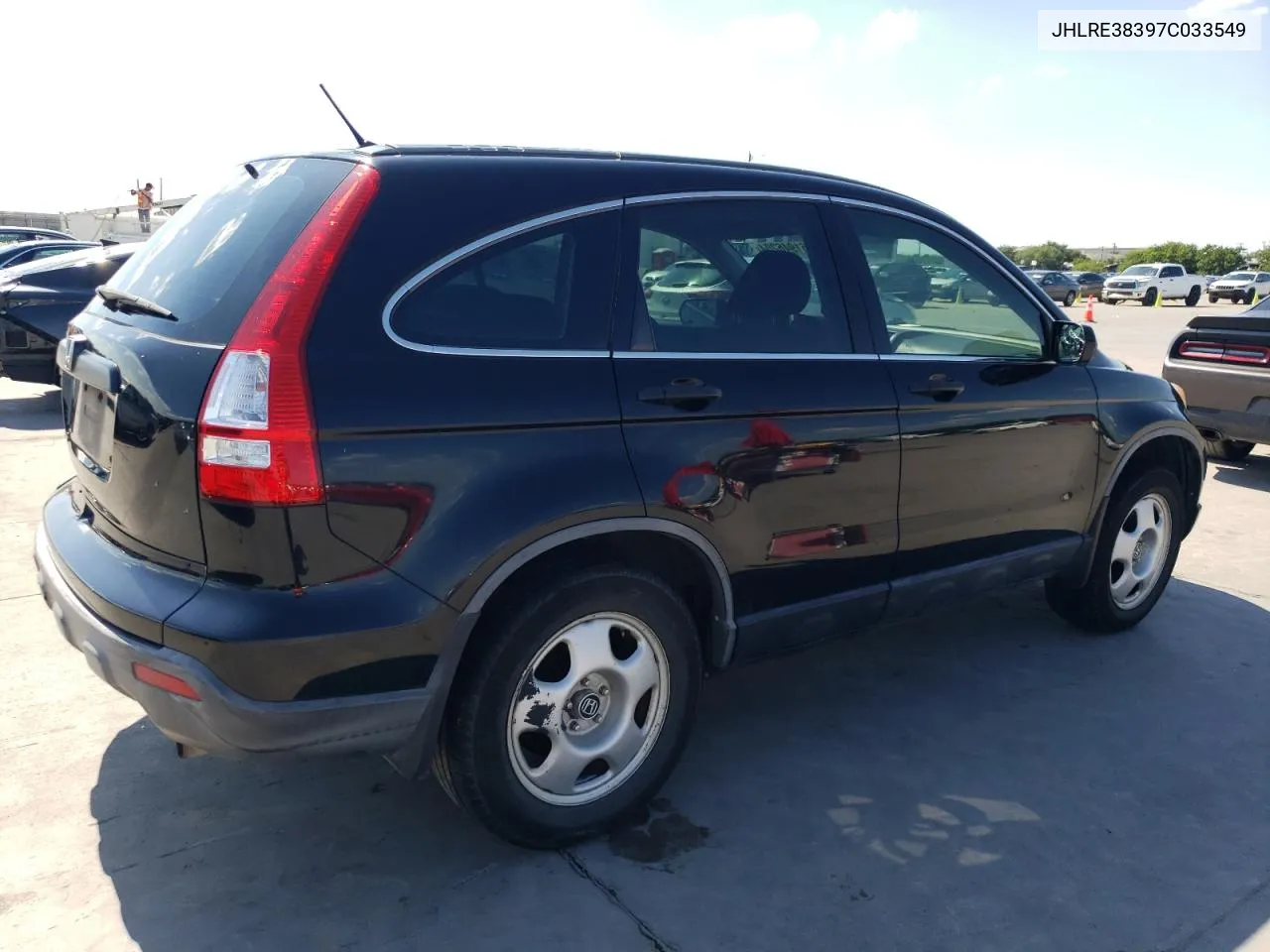 2007 Honda Cr-V Lx VIN: JHLRE38397C033549 Lot: 61946204