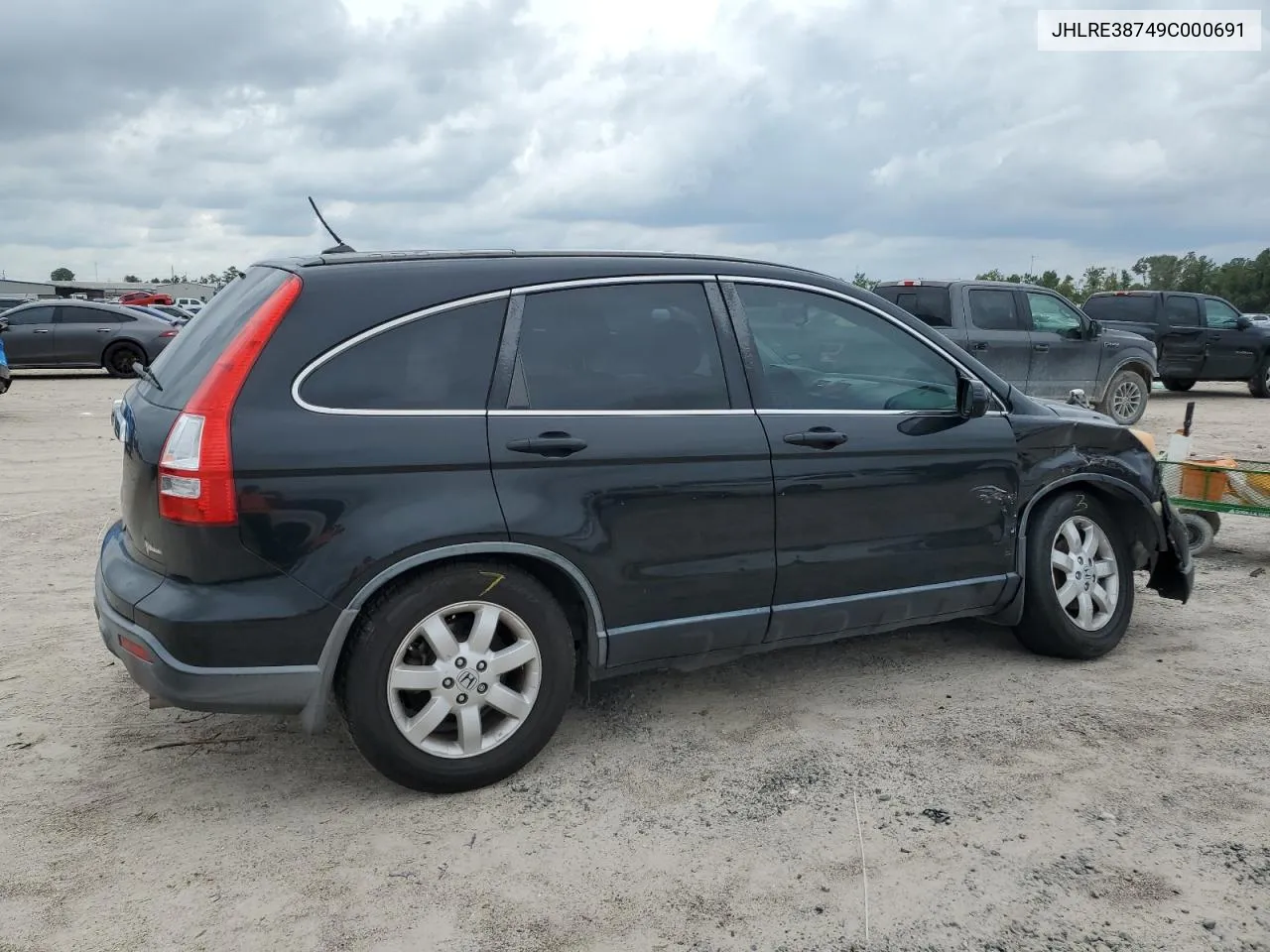 2009 Honda Cr-V Exl VIN: JHLRE38749C000691 Lot: 70089644